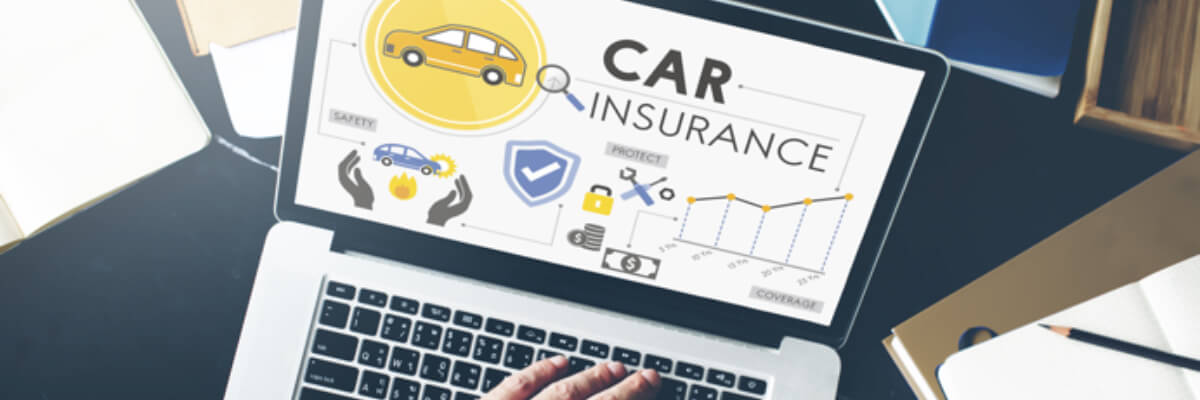 car insurance on laptop